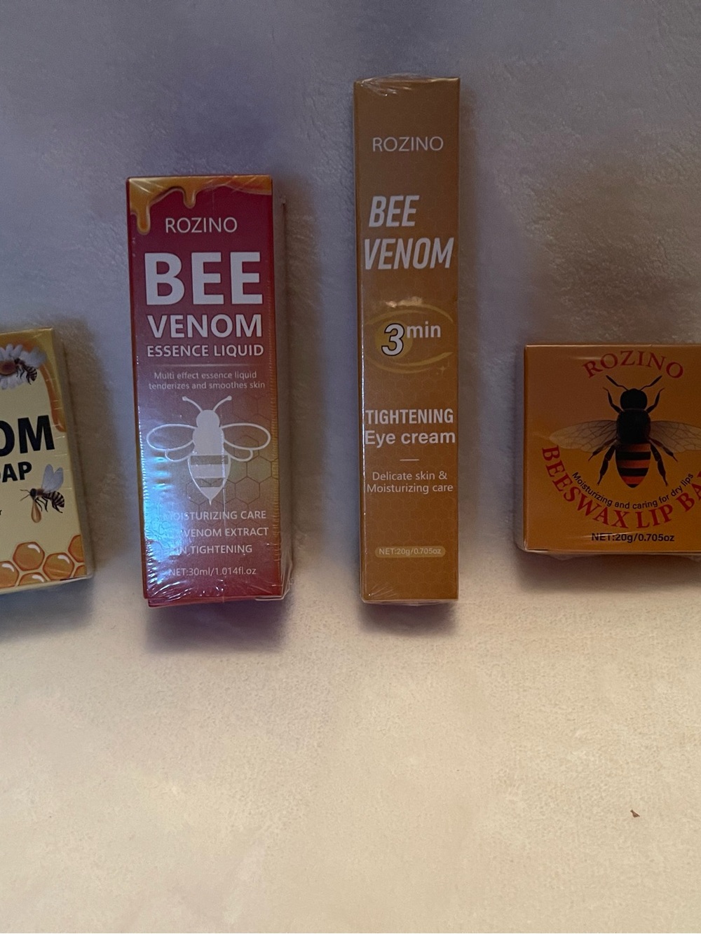ROZINO Bee Venom Tightening Eye Cream & shampoo, essence liquid and lip balm